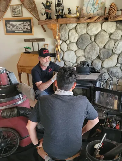 Professional chimney cleaning service in action